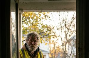 As my eight-year-old drew her final, shallow breaths, the local sanitation worker arrived at our door. Beside him stood a scarred pitbull clutching a mangled tennis ball, carrying a secret that would unmask the life I thought I knew.